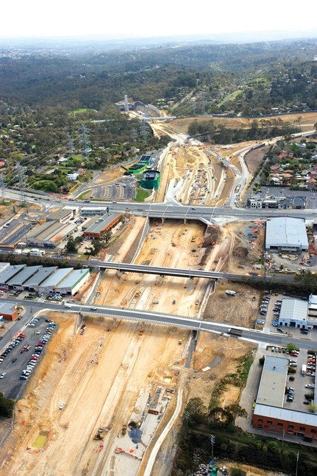 EastLink Toll Road construction — aerial view of freeway interchange and earthworks, Melbourne