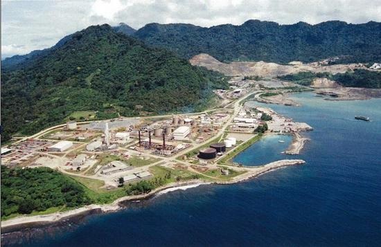 Lihir Gold Mine, Papua New Guinea — aerial view of coastal processing facility and port infrastructure